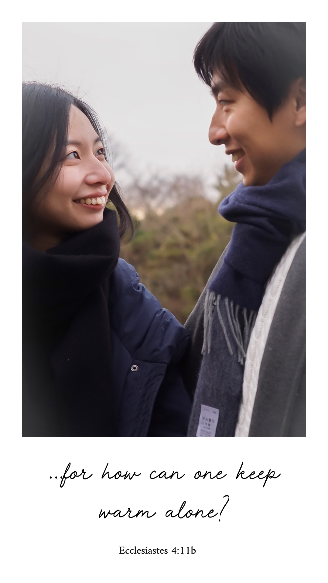 A couple posing for their prenuptial photos