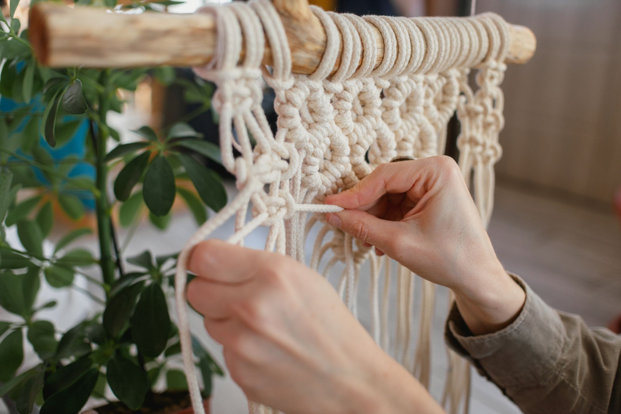 Person doing Macramé