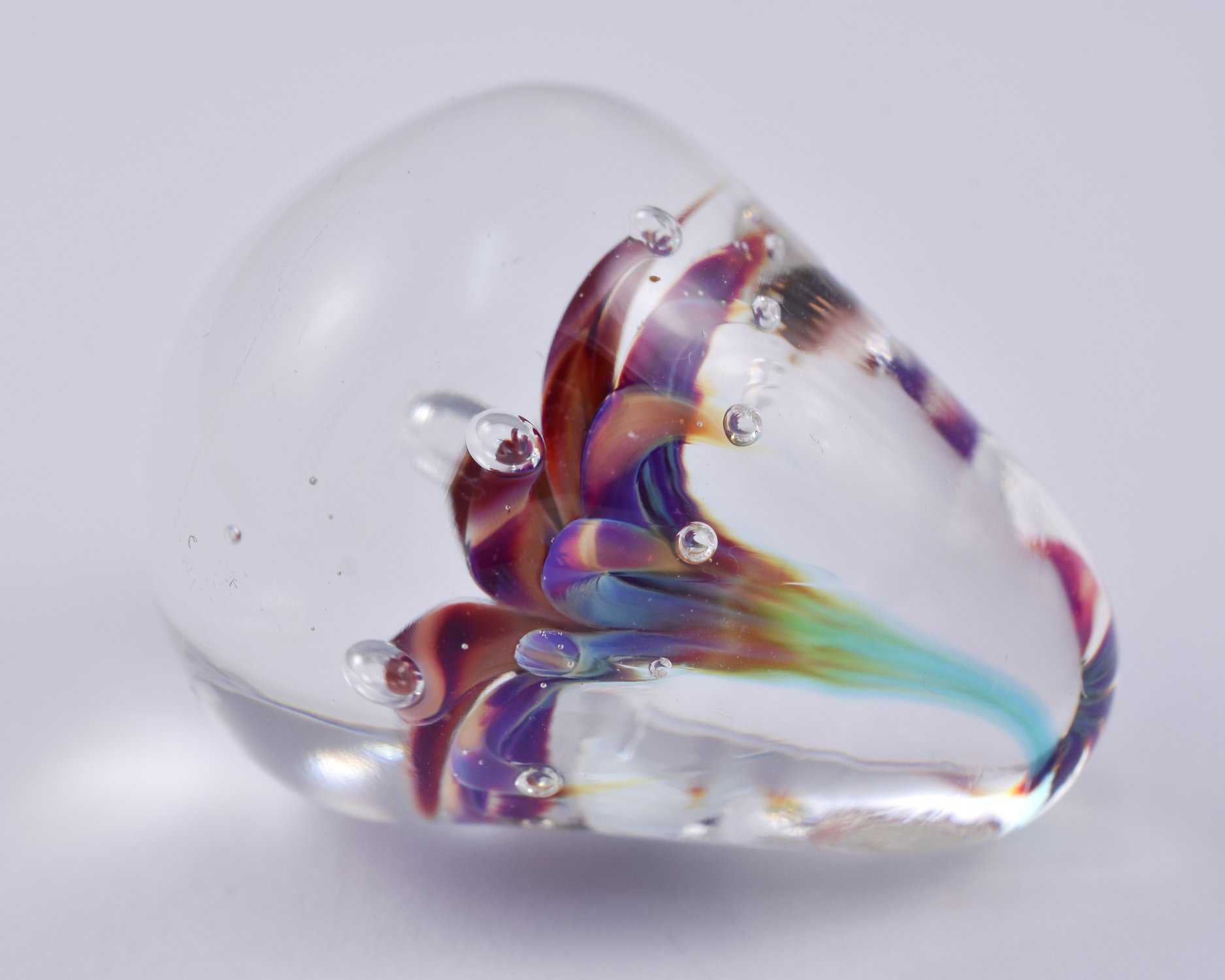 a lampwork flower implosion