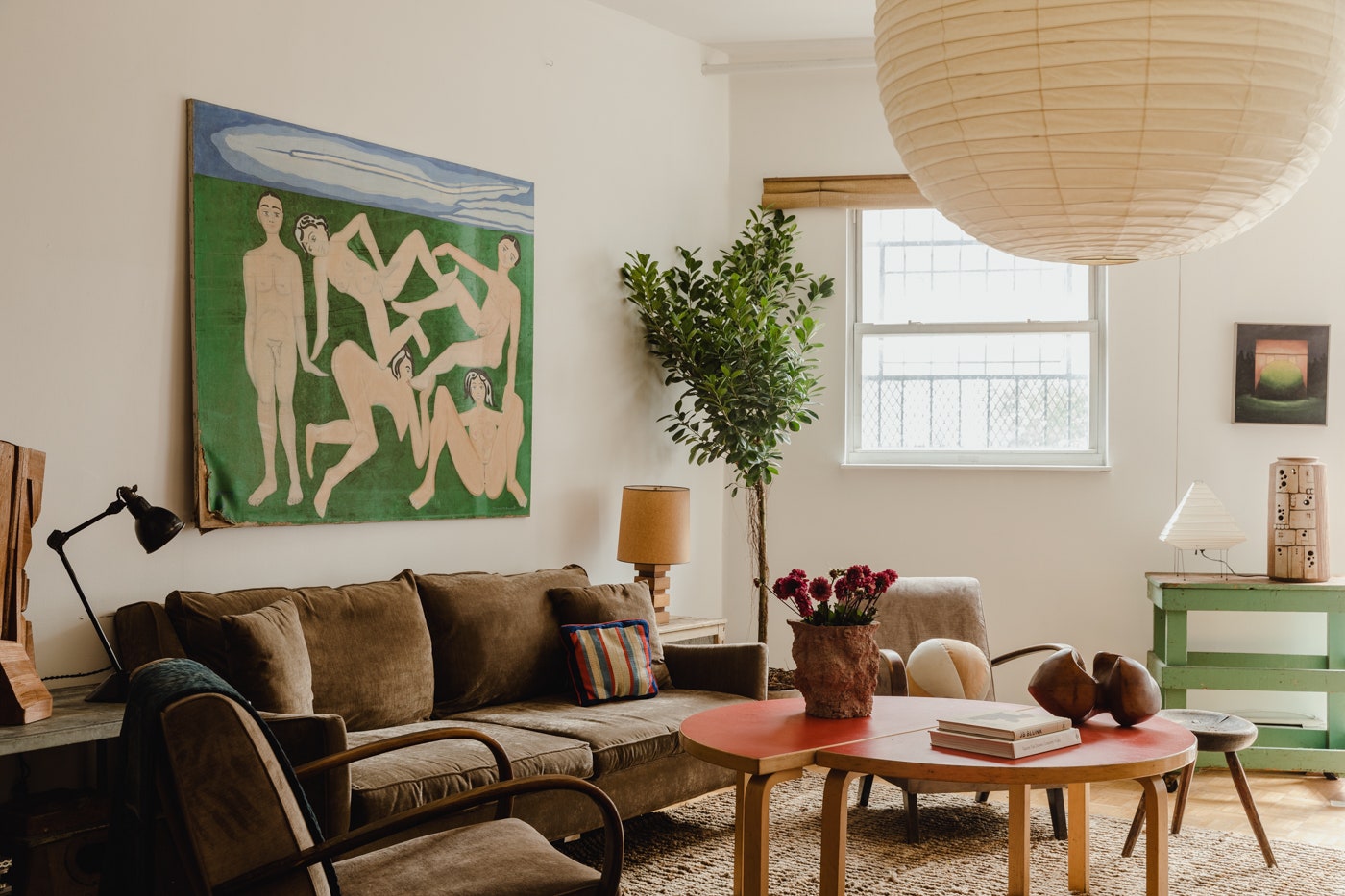 The living room of designer Jonny Ribeiro illustrates how to layer vintage pieces