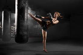 Woman Kicking Bag