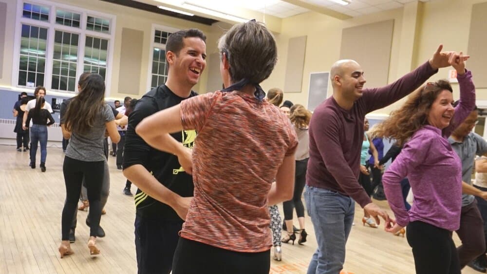 Couples dancing salsa