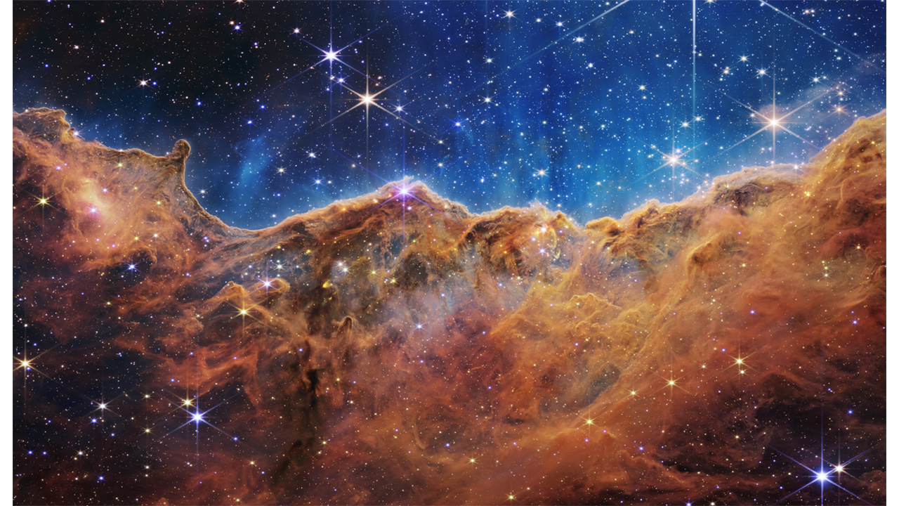 telescope image of the cosmic cliffs in the carina nebula