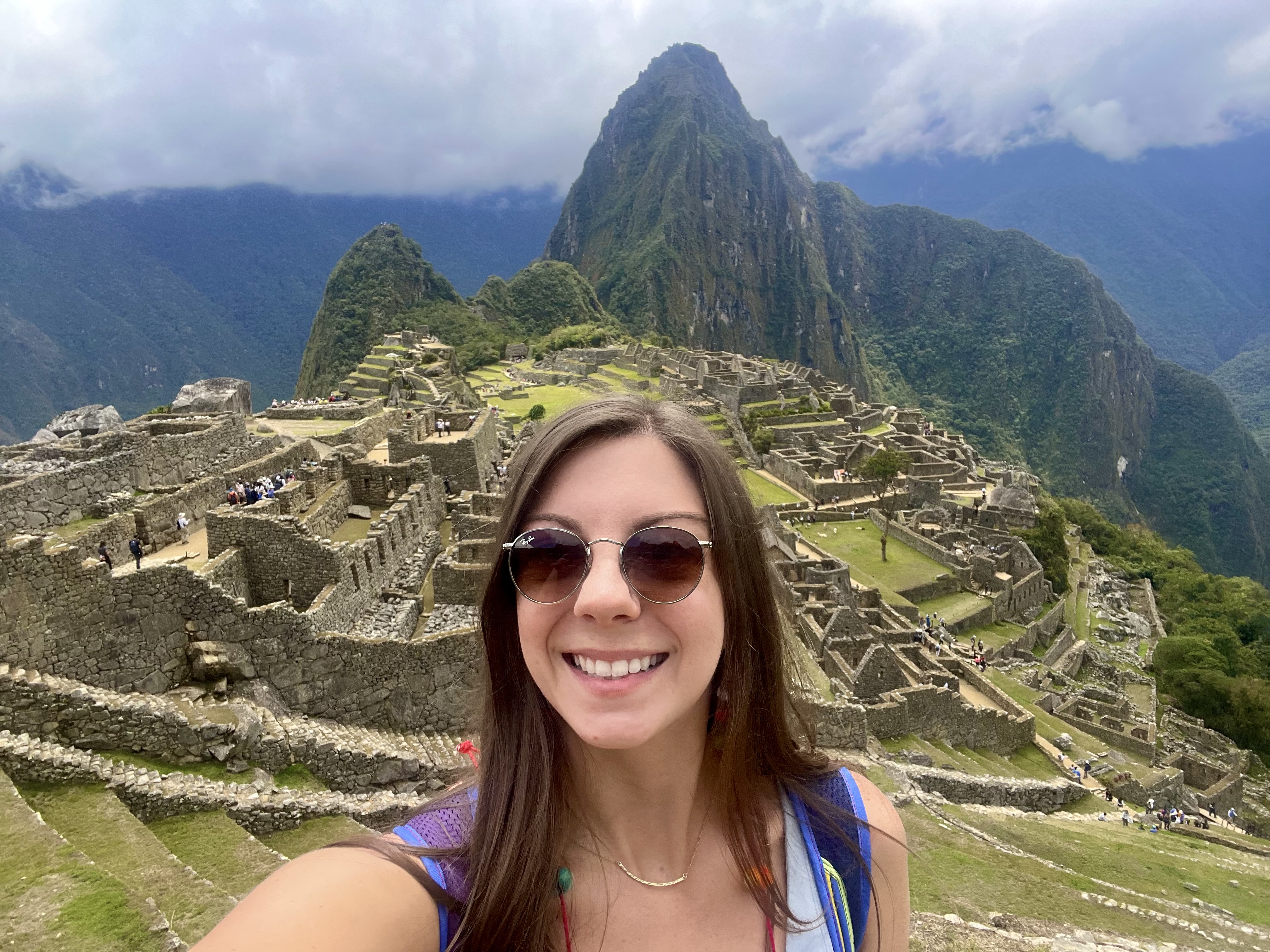 girl standing infront of Macu Picchu