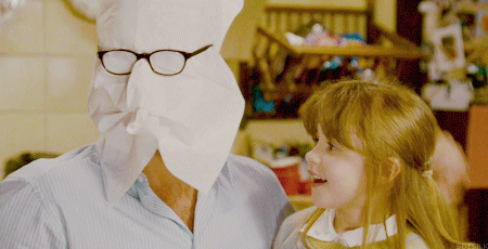 Jude Law with napkin over his face