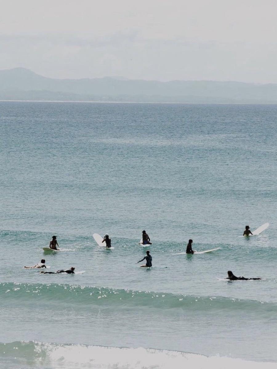 surfers in water
