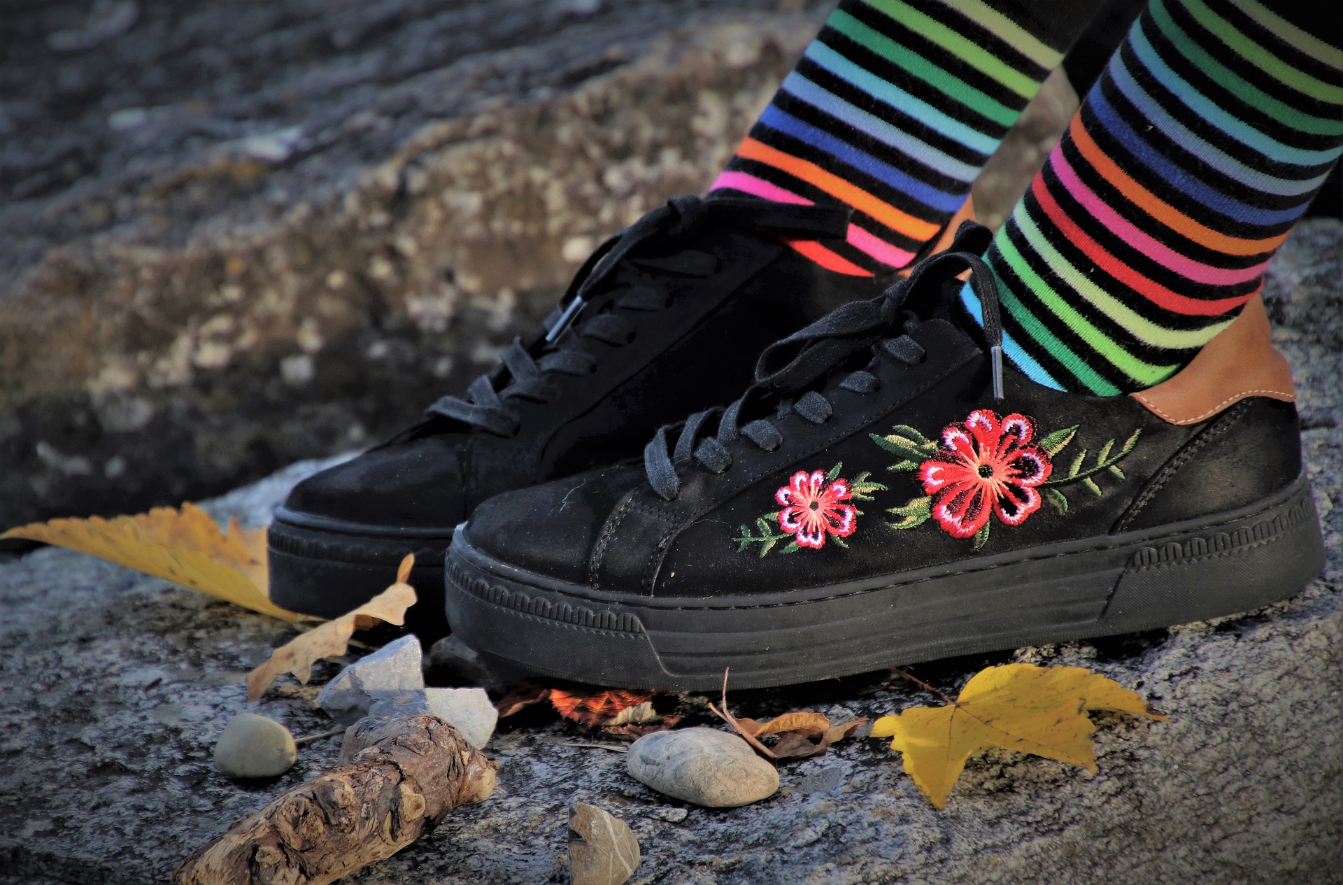 embroidery flowers on a black canvas sneaker