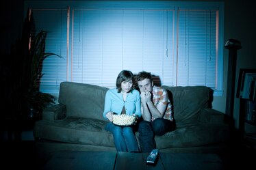 couple watching horror movie