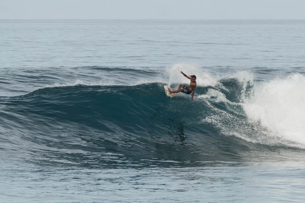 Guy Surfing in Lombok