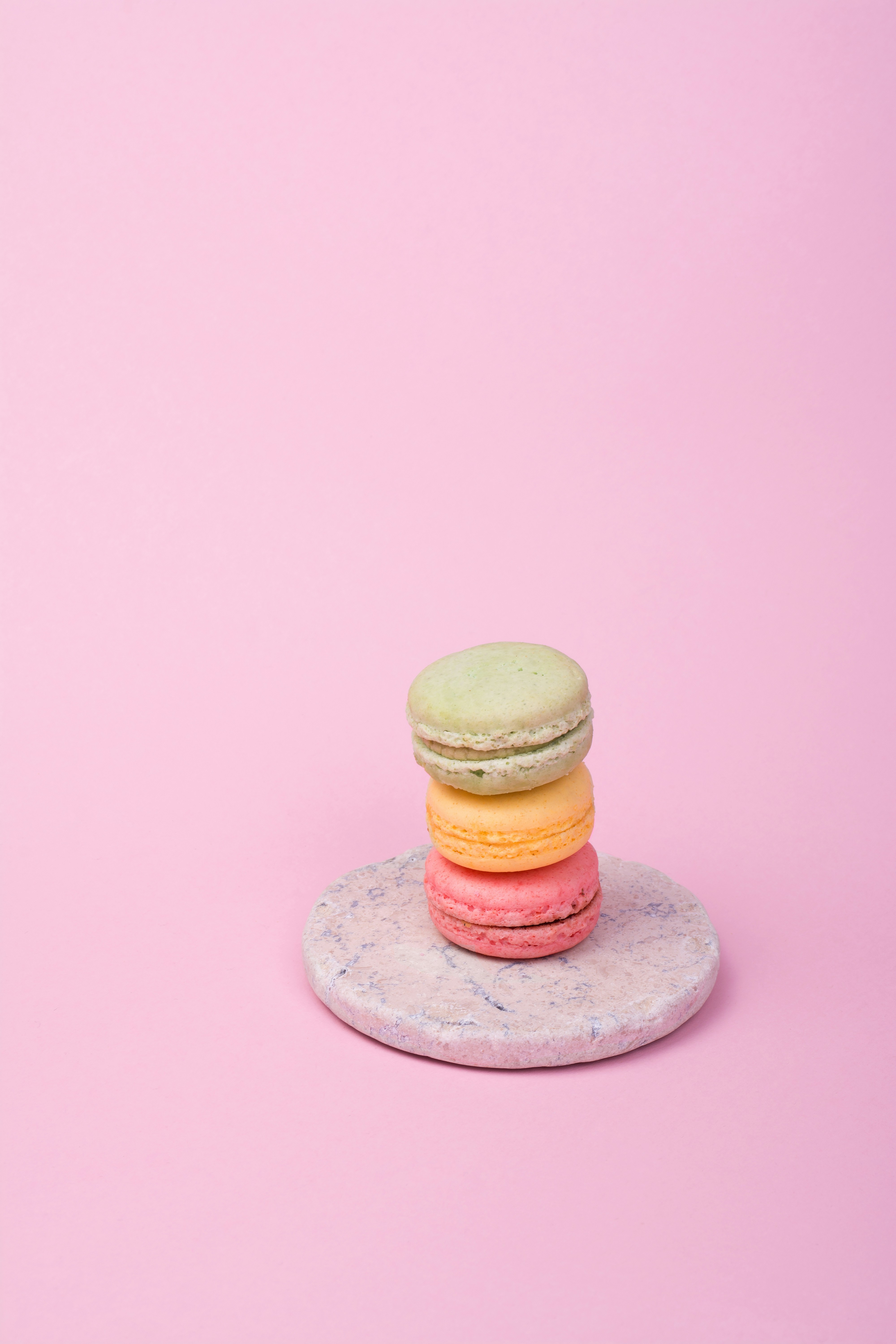 pale-green, orange and pink macarons