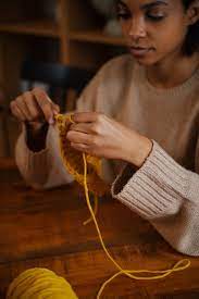 woman crochetting