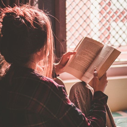 Woman reading book