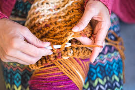 woman crocheting