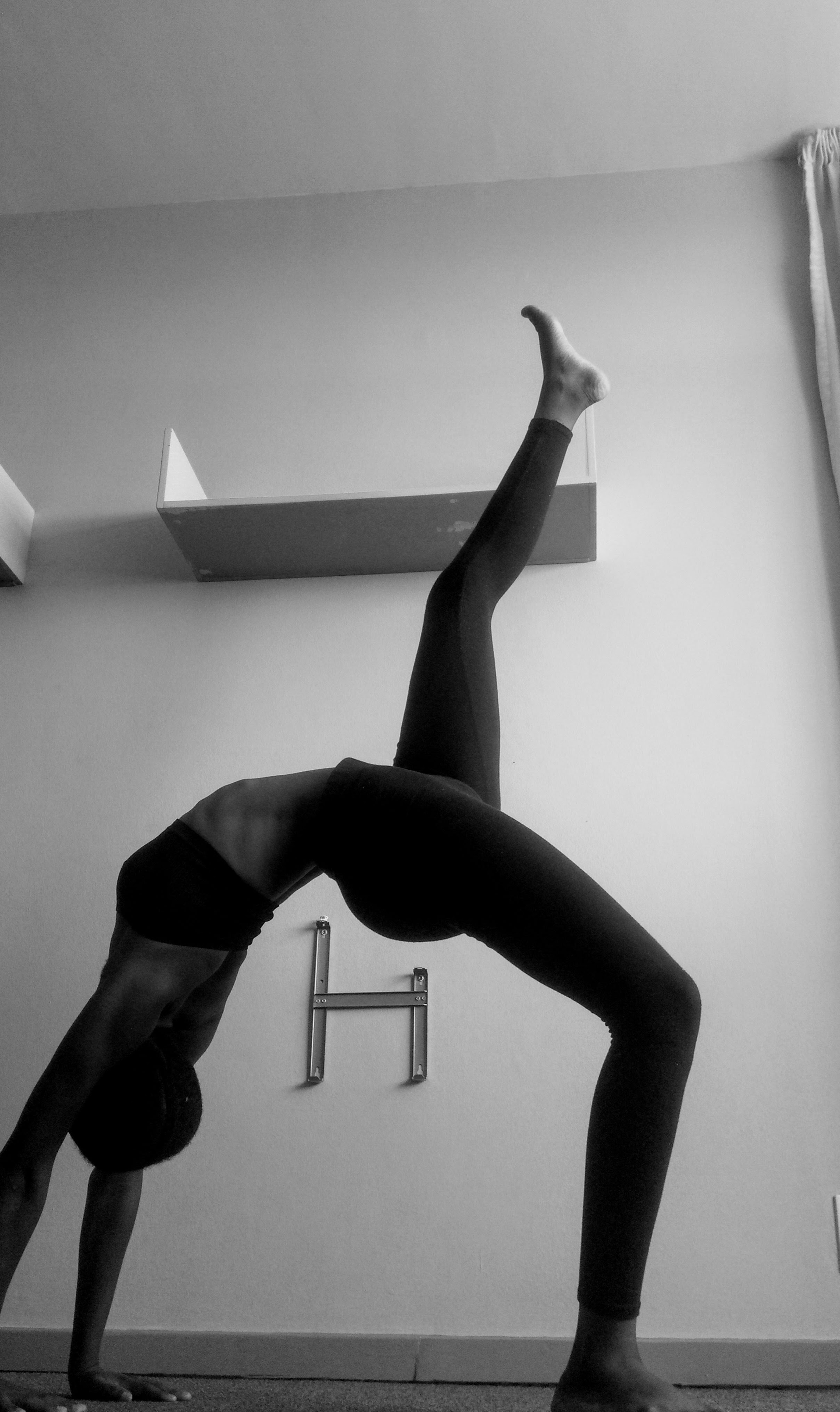 A woman stretching her back