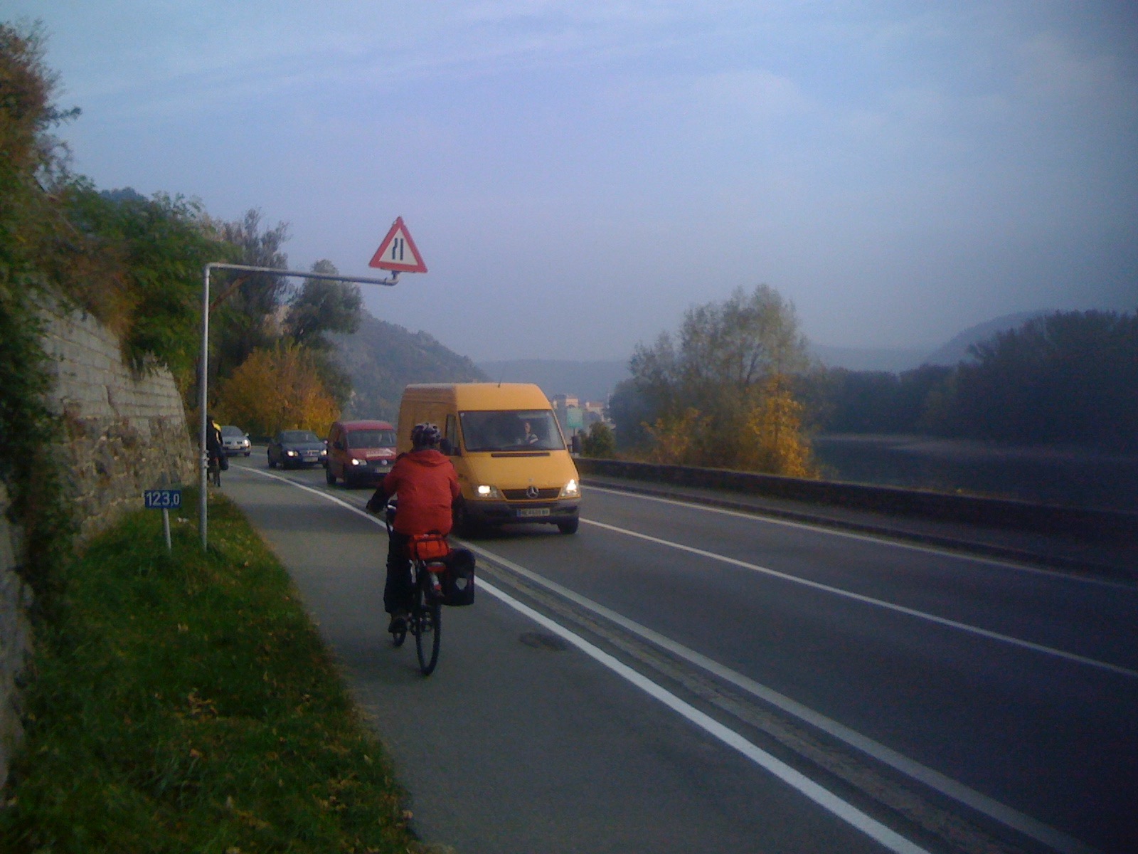 image of cyclist along a highway on the Donau Bike Path