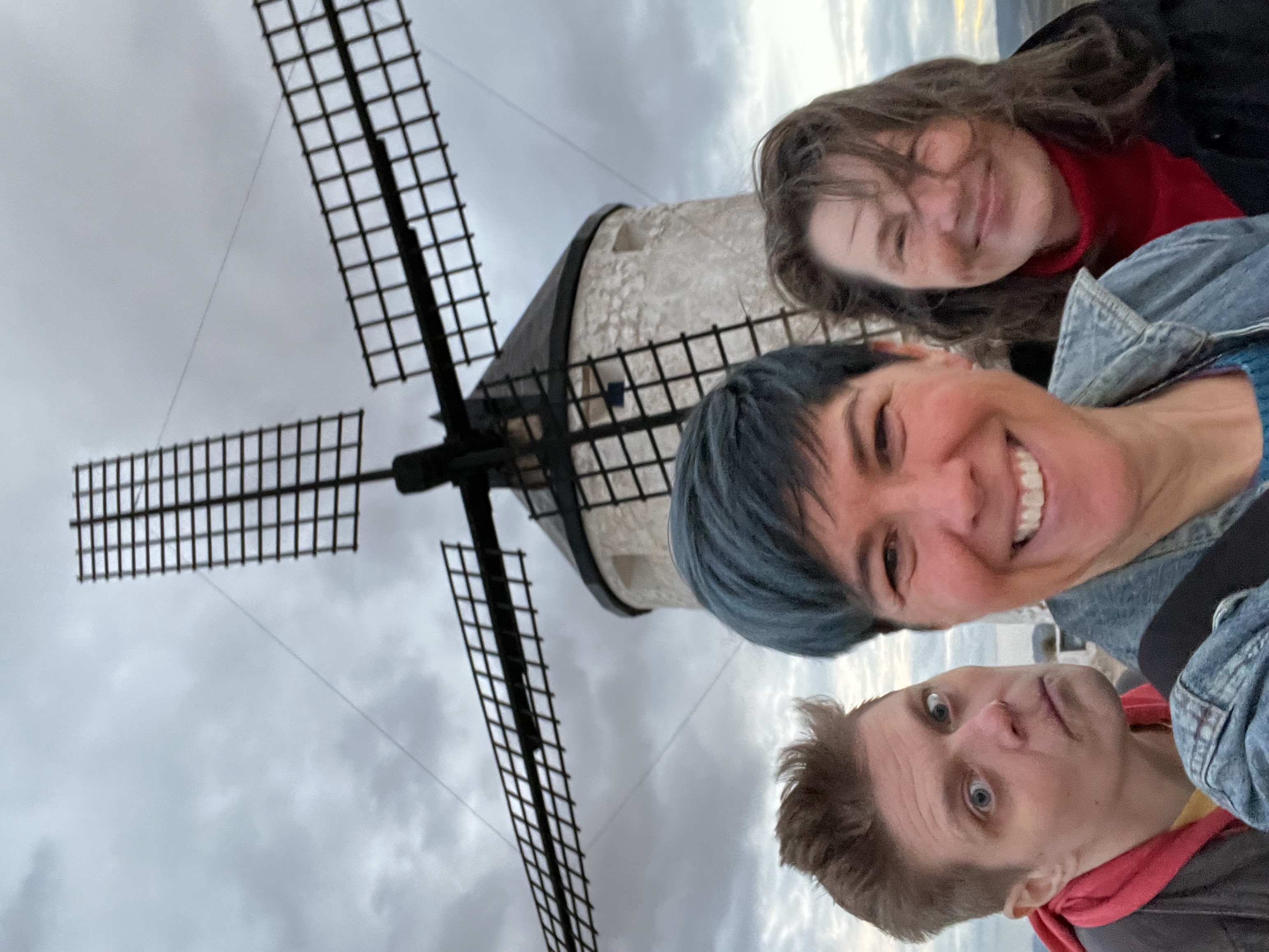 close up of three women at the windmills in Spain