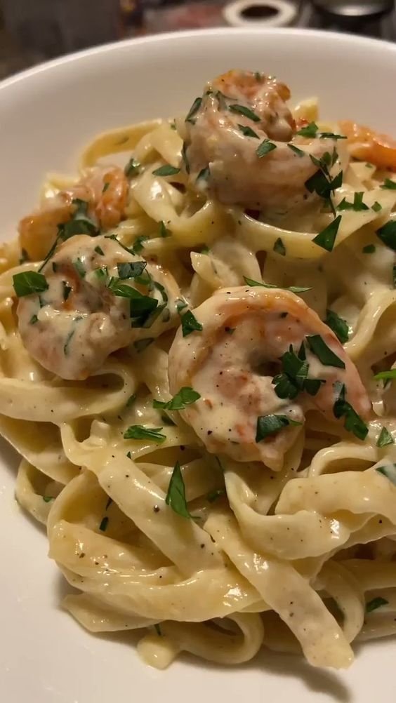 A picture of spaghetti and shrimp