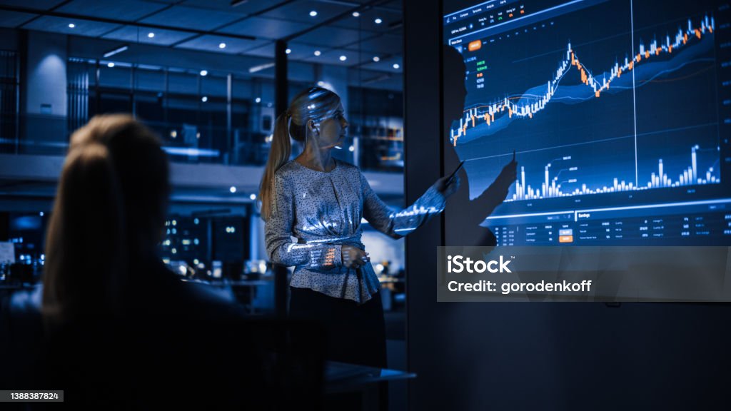 https://www.istockphoto.com/photo/portrait-of-a-financial-analyst-working-on-computer-with-multi-monitor-workstation-gm1358049863-431786269