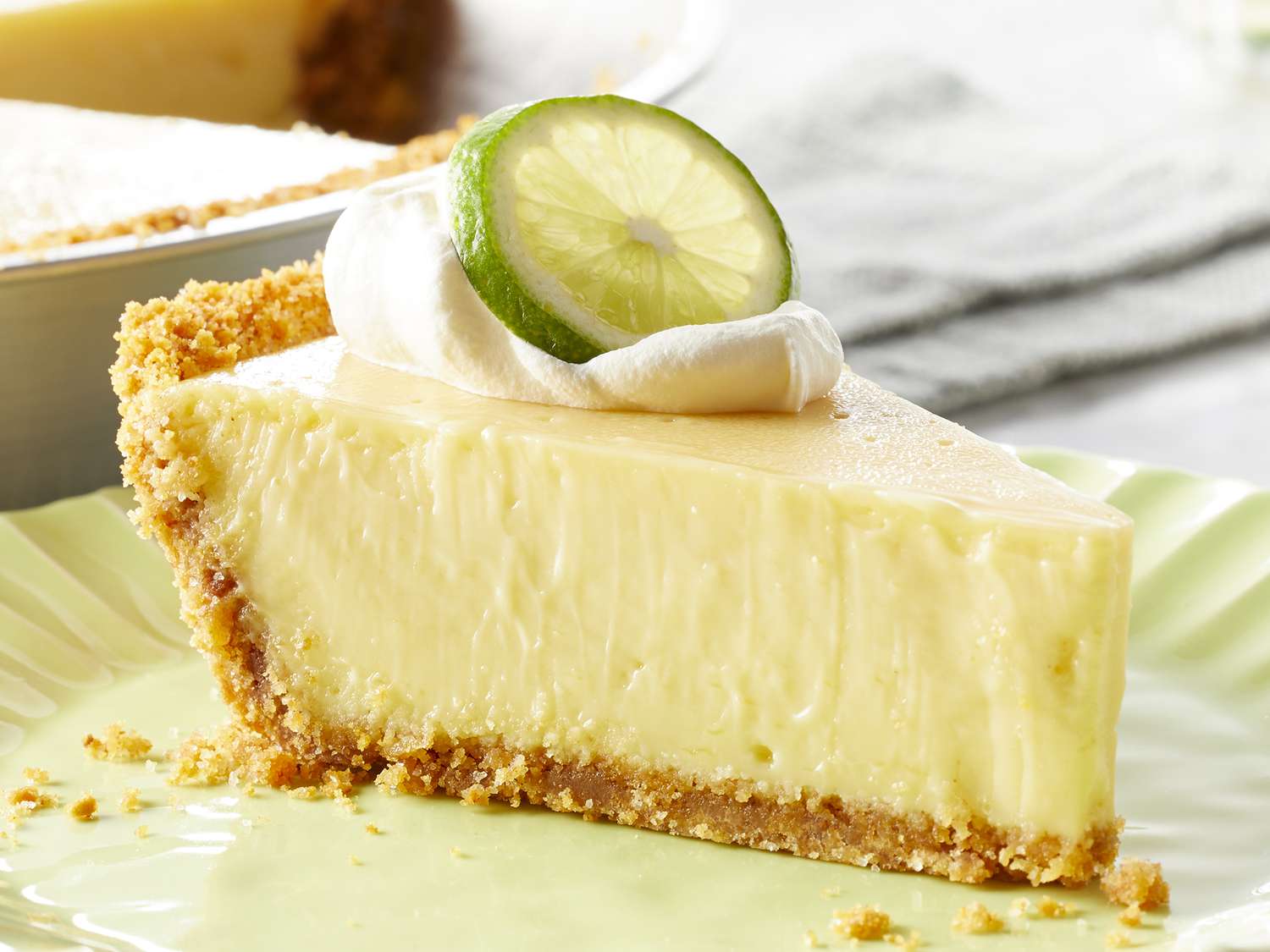 A delicious slice of Key Lime Pie with a graham cracker crust