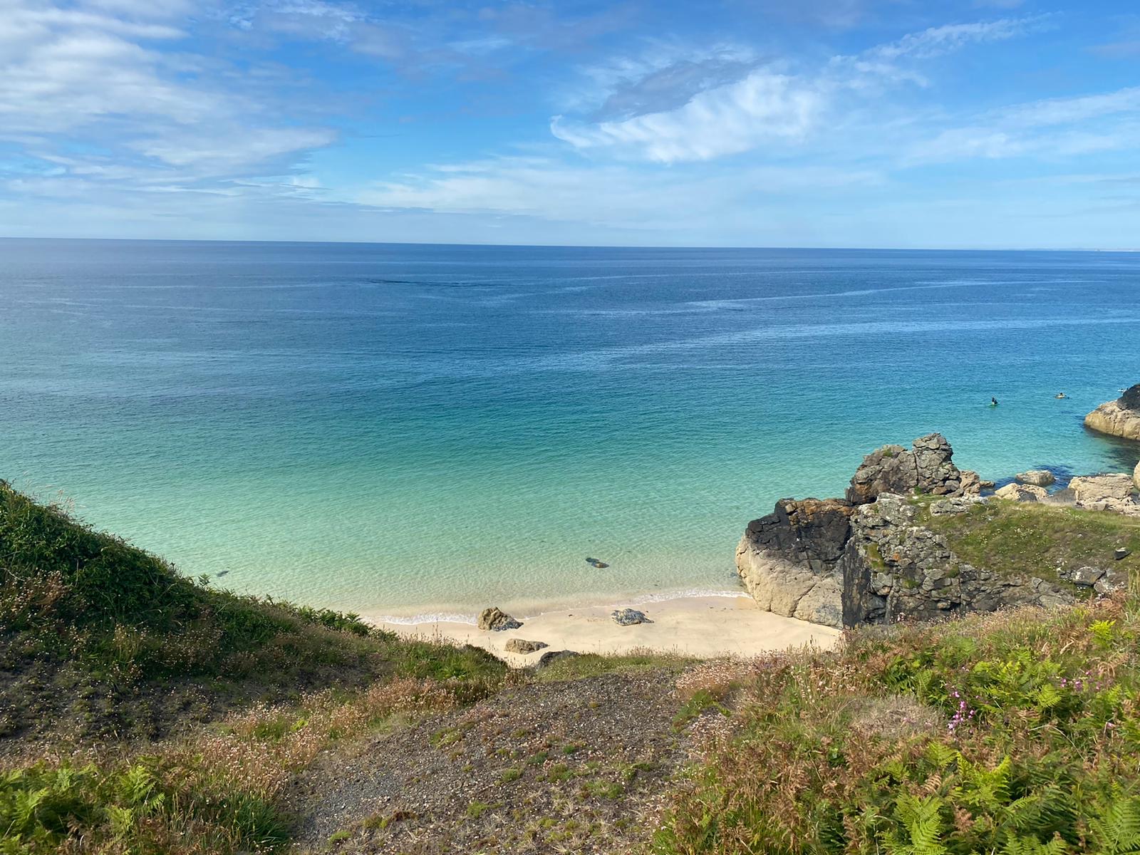 View of the Cornish coast with a serene wellness theme