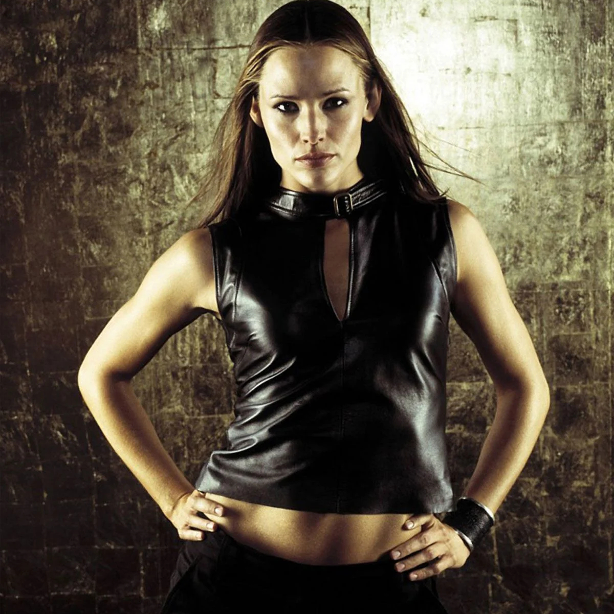 the character Sydney Bristow in Alias, played by Jennifer Garner, stood with her hands on her hips