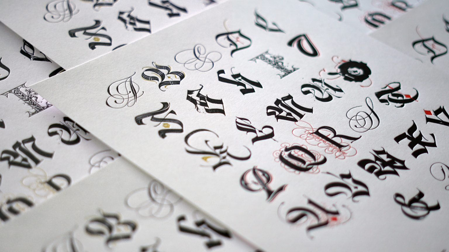 Alphabet written with calligraphy.