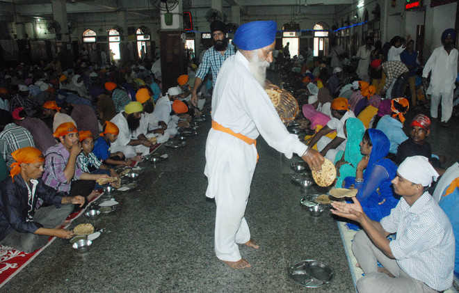 Gurdwara Langar Seva (selfless service of feeding free food to all)