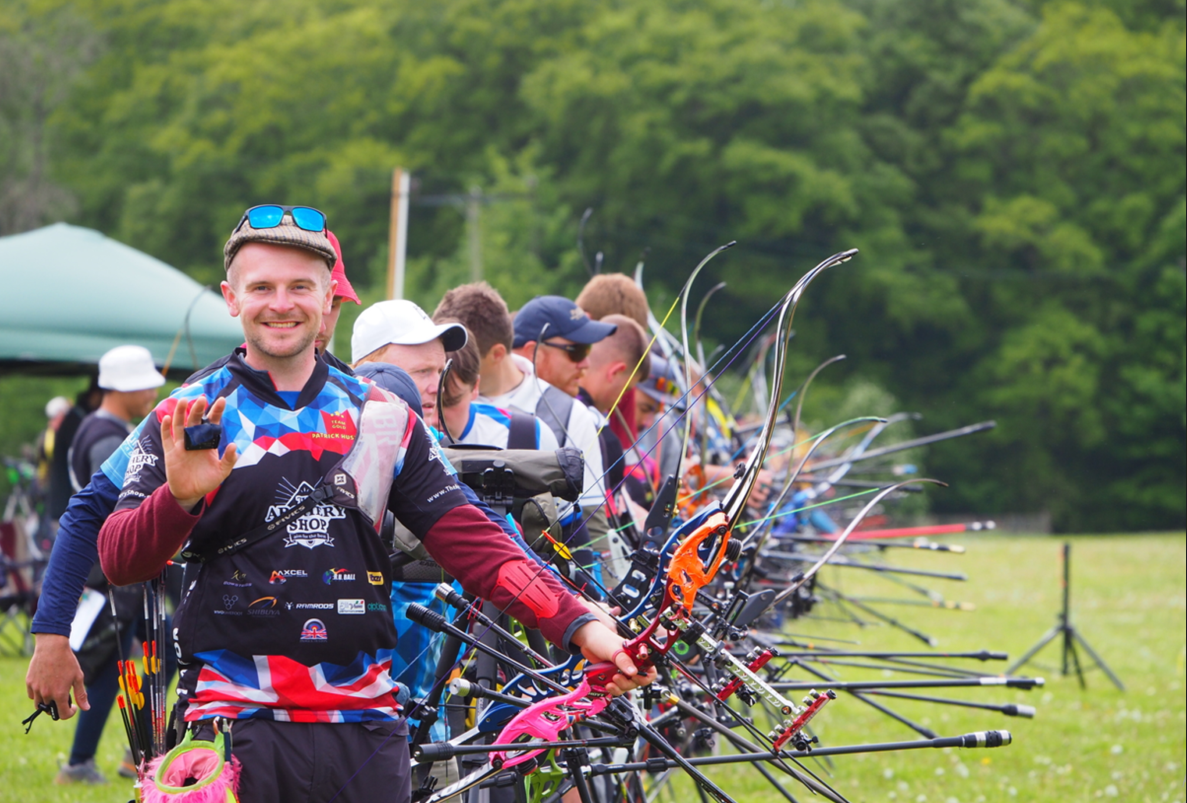 People enjoying archery