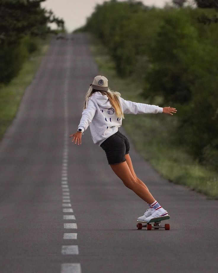 girl skating on Longboard