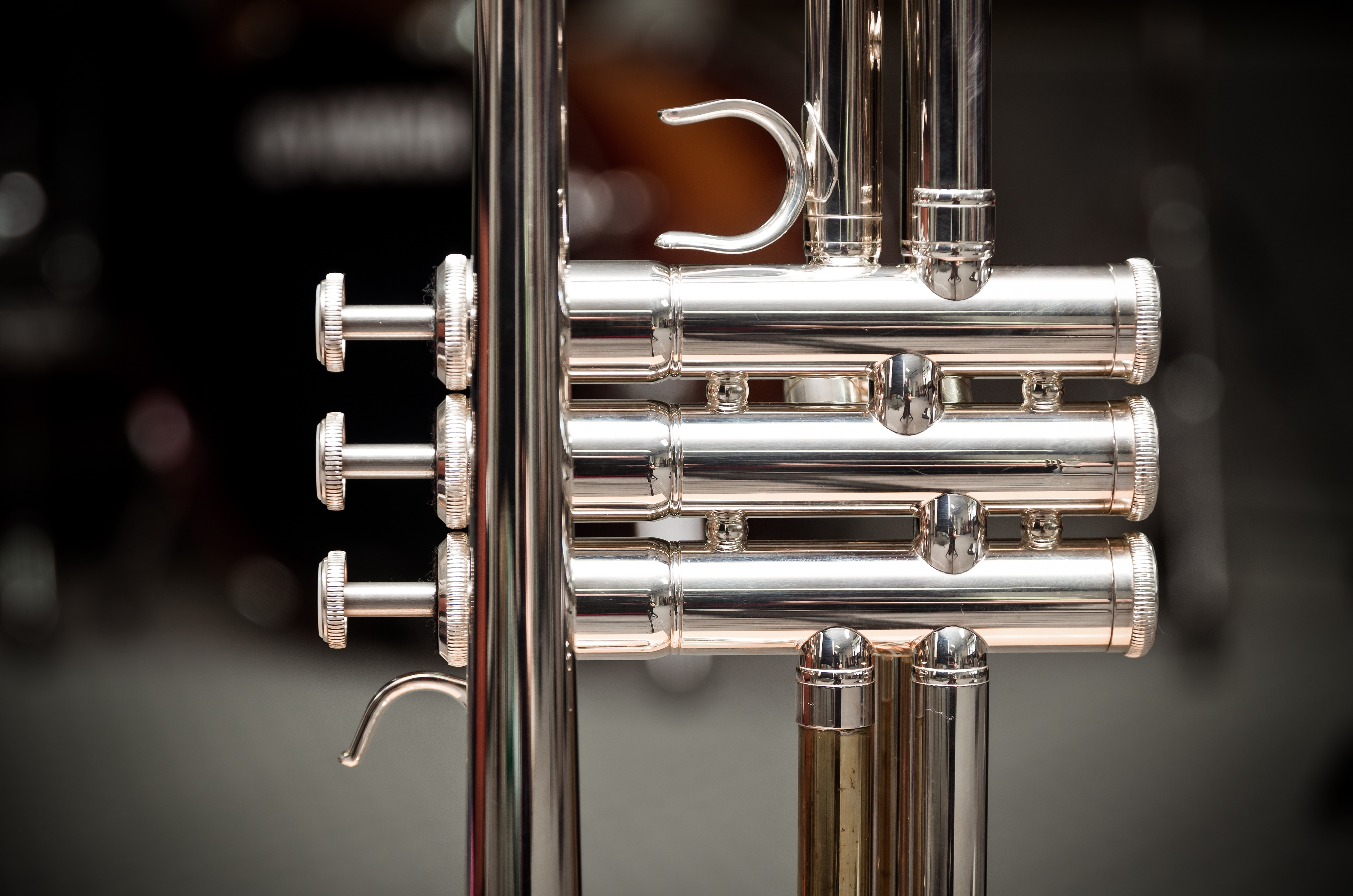 Valves of a silver trumpet
