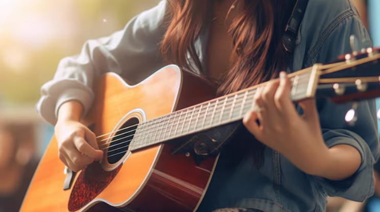 Girl playing guitar