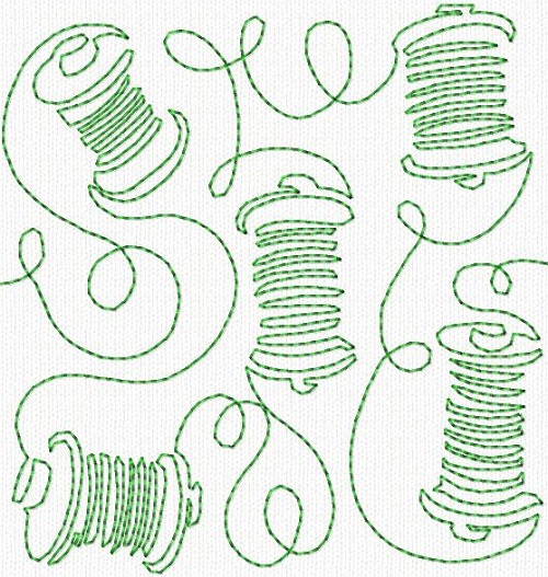 Green thread spools stitched into fabric