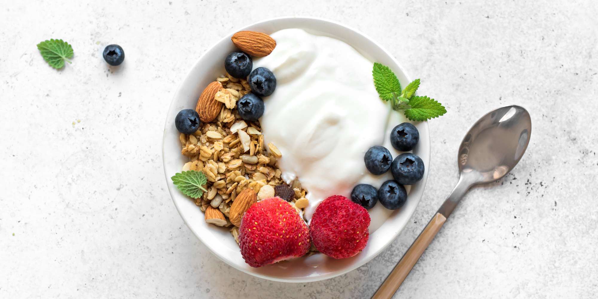 Greek yogurt bowl with granola and berries
