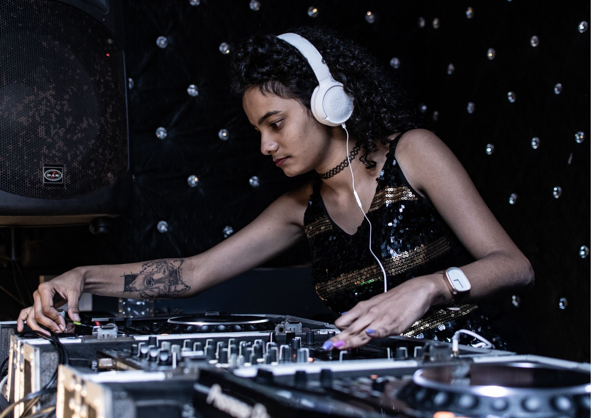 Female DJ mixing on set