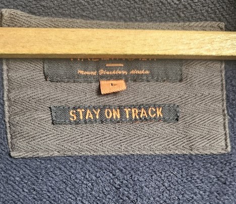 Text 'Stay on track' aligned with clothing