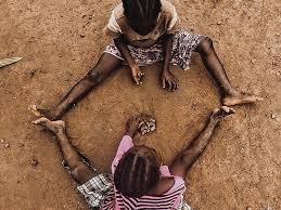 Two girls palying diketo