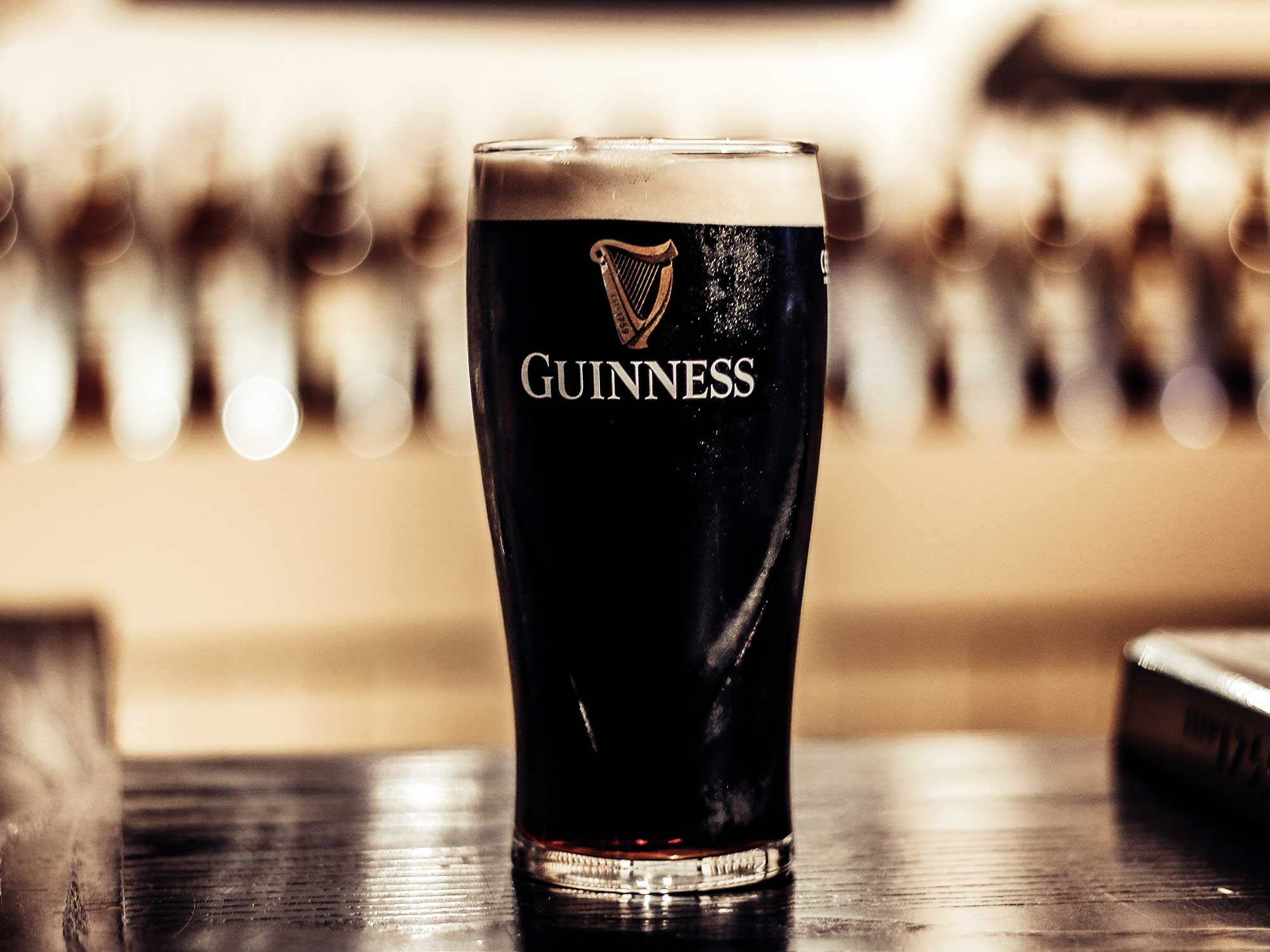 Guinness pint on a bar