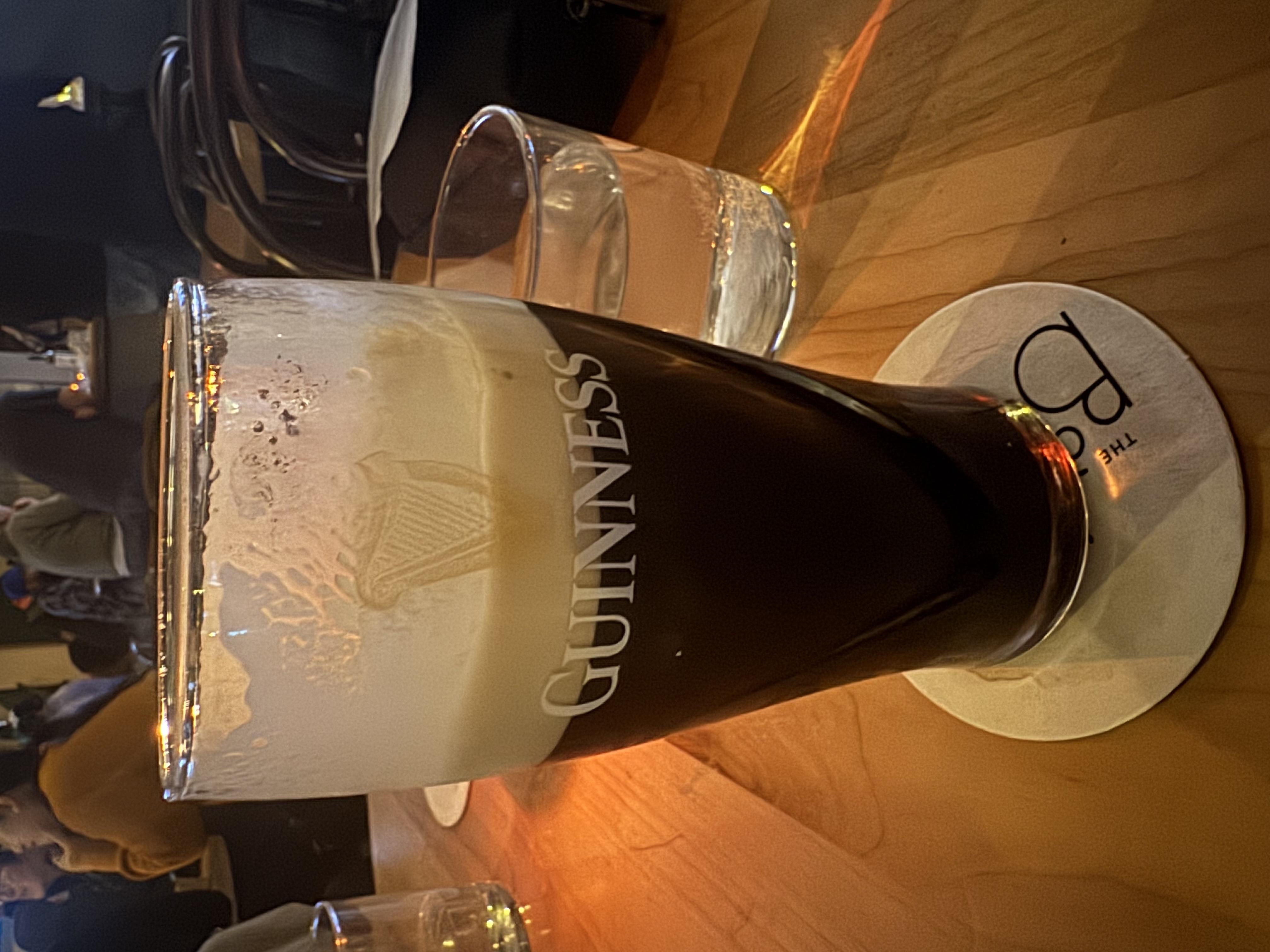 Guinness pint with a split G
