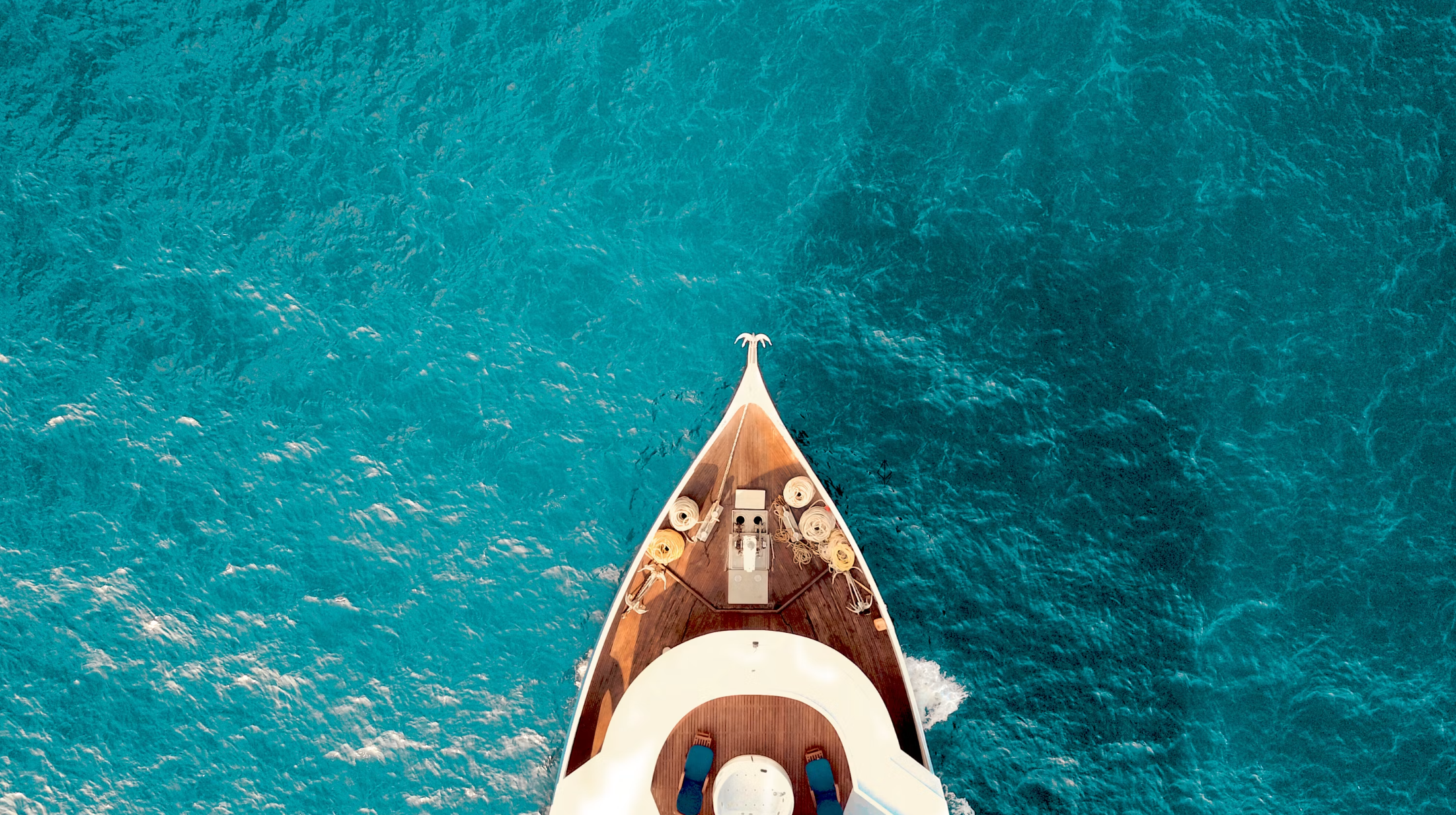 Yacht in Sardinia in crystal-clear waters