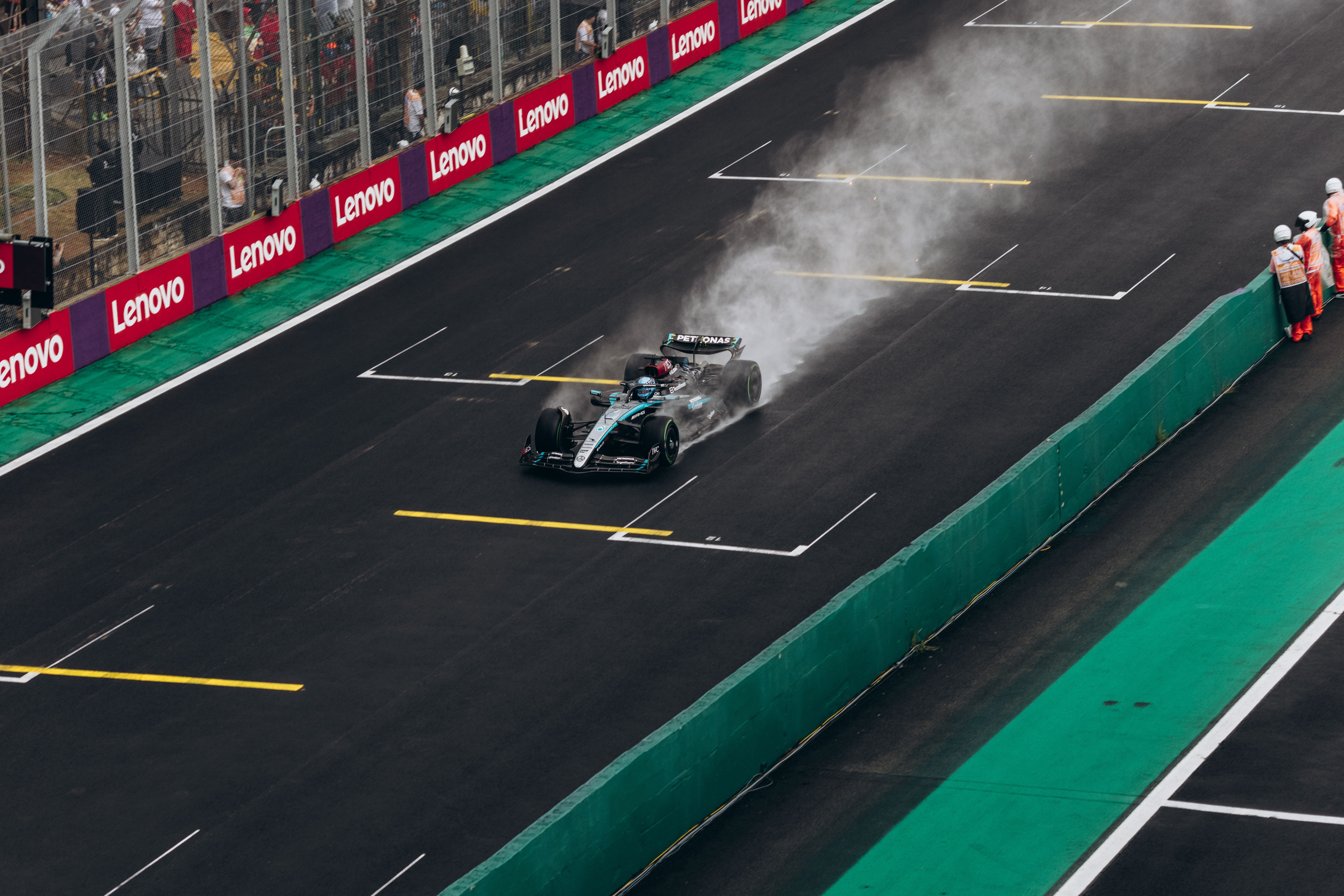 F1 Car Driving on Wet Track