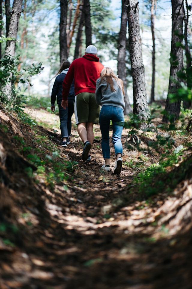 three people walking