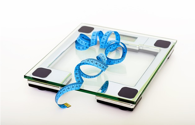 Weight Loss Food: Weighing Scare and Tape Measure to Monitor Weight