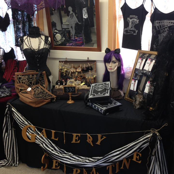 Our very cute table display at Goulburn complete with kitty ears and custom corset t-shirts and singlets