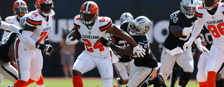 Cleveland Browns running back Nick Chubb (24) runs for a touchdown against the Oakland Raiders in the second quarter at Oakland Coliseum.