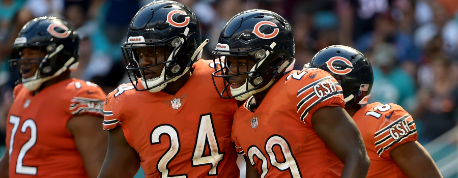 Chicago Bears running back Tarik Cohen (29) reacts next to Chicago Bears running back Jordan Howard (24) against the Miami Dolphins during the second half at Hard Rock Stadium.