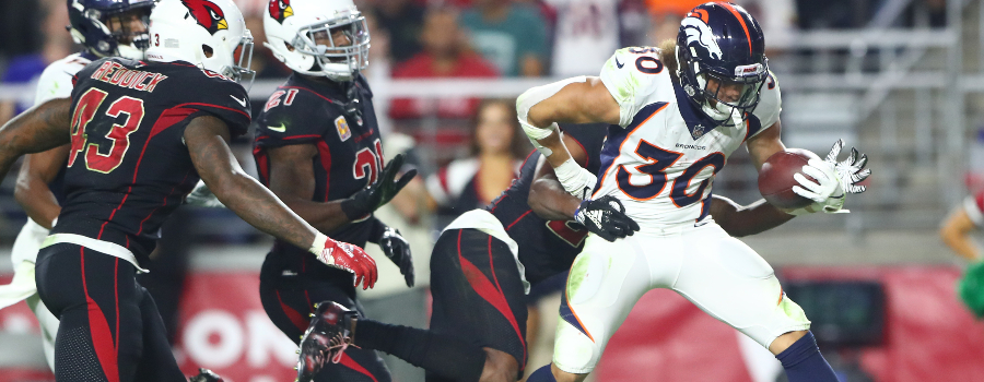 Denver Broncos running back Phillip Lindsay (30) scores a third quarter touchdown against the Arizona Cardinals at State Farm Stadium.