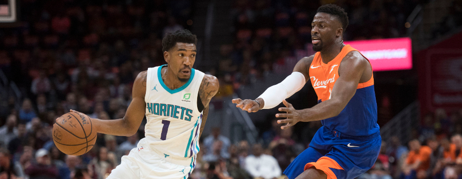 Charlotte Hornets guard Malik Monk (1) Cleveland Cavaliers guard David Nwaba (12) during the first half at Quicken Loans Arena.