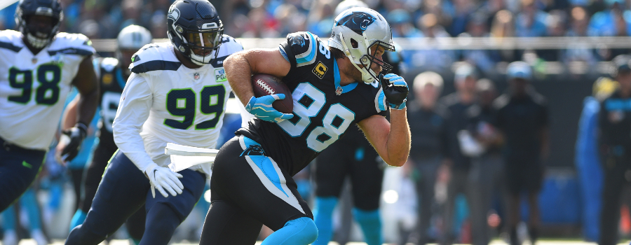 Carolina Panthers tight end Greg Olsen (88) with the ball as Seattle Seahawks defensive tackle Shamar Stephen (98) and defensive end Quinton Jefferson (99) defend in the first quarter at Bank of America Stadium.