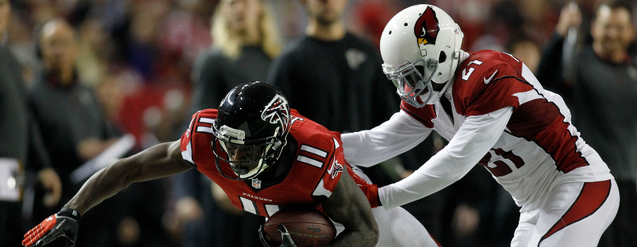 Atlanta Falcons wide receiver Julio Jones (11) is pushed out of bounds by Arizona Cardinals cornerback Patrick Peterson (21) in the third quarter at the Georgia Dome. The Falcons defeated the Cardinals 29-18.