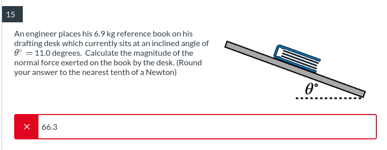 15 An engineer places his 6.9 kg reference book on his drafting